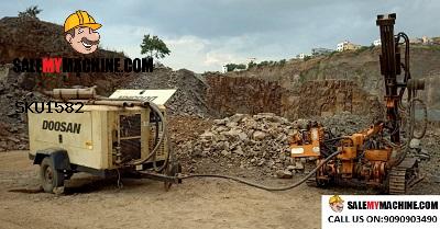 COMPRESSOR WITH CRAWLER DRILL